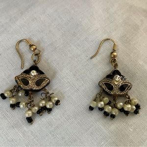 Black and gold tone hanging earrings